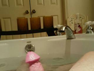 Lounging in the tub with my rock hard cock.