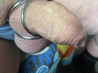 Slipping on my new triad metal cockring.