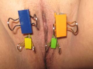 some pussy toture with binder clips.  it actually feels really good. :)
