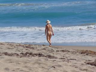 nude women walking on beach