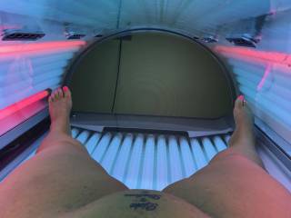 Sub tanning my pussy. You can see my mark on her mound.