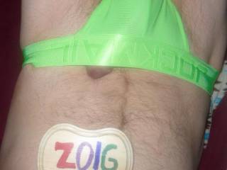 I am in bed wearing a lime undie, and the tip of my erection is barely visible. Z50 camera was used.