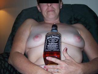 have a shot of Jack and then fill you with this hard cock until you cum all over it, then have you ride me hard! Fuck me !