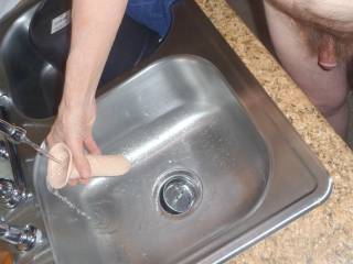 A frontal as I stand near my kitchen sink and washing the dish soap out of my new toy in late April of 2025... Z4 camera was used.