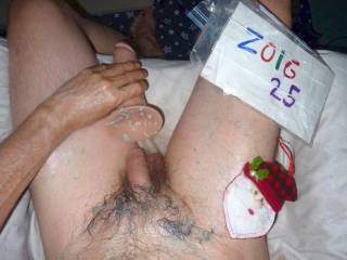 Above view with green lube upon my dick & skin... holding my toy near my dick, so, that I can reinsert it...Z50 camera was used.