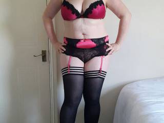 Me in a pink and black underwear set with hold ups.