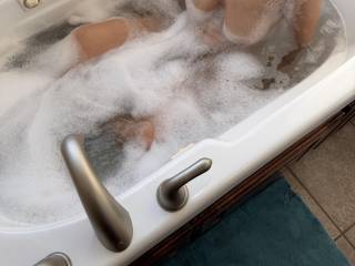 Those bubbles are clinging onto that body like my mouth likes to, would you help her get the bubbles off?