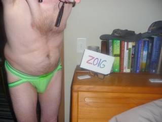 A partial body standing scene as I wear my lime undie near my bed headboard- where most of my books are situated. TZ 4 Panasonic camera was used.