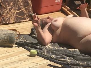 Wife sunbathing nude