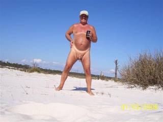 Here I am nude on the beach in Alabama enjoying myself,wish you were here.