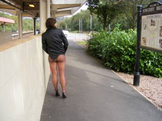 at local train st. flashing her pussy and arse in sheer tights