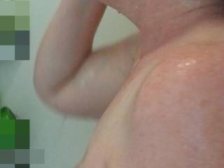 Her huge left boob in the shower