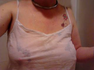 Just out of the shower wearing her camisole...
My Submissive doing as requested in Sussex.