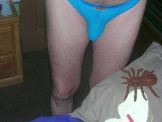 Another frontal standing view of me wearing my undie as I stand near the bed. A Nikon S10 camera was used.
