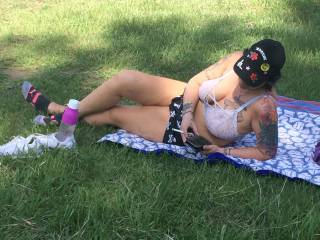 Had some fun watching her laying out with a see thru bra on. Baggy shorts to give them pussy view. Several stopped to gawk at her. I stayed away to allow them to see.