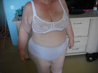 Very nice.  Love the big panties and the lacy, sheer bra on your curvy body.