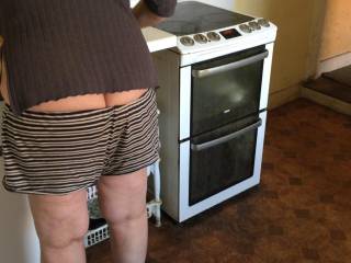 2 of 3 - horny maid. Facing the worktop, she asks for underwear to be pulled off