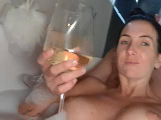 Soaking her vagina in the bath, getting ready for a good dicking