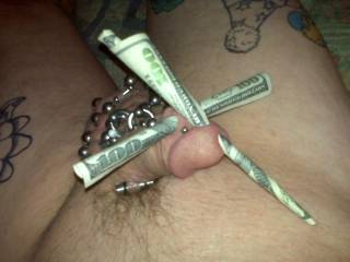 decided to put some $100 bills thru my prince albert and frenum piercings. cool,huh?