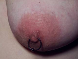 Close-up of Wifey's left titty with her new Large Purple Hoop, really get to tug on these!