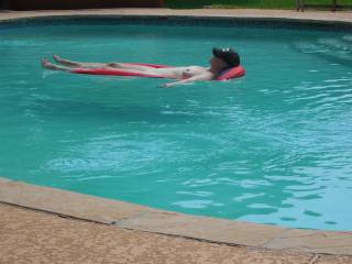 Laying out in the pool relaxing