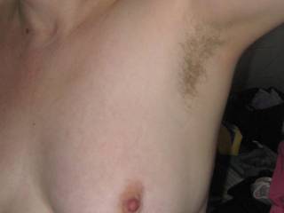 For those that enjoy the sight of lovely underarm hair and a hard nipple on a soft breast.