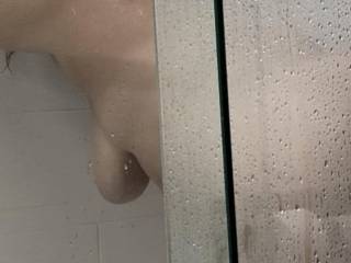Bending over this slut in the shower.
