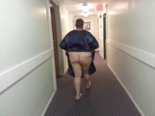 Walking down the hallway of our apt building!