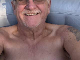Naked in hot tub