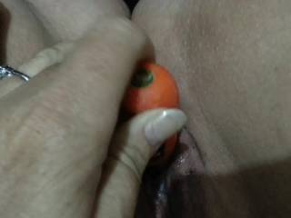 Always knew that carrots were good for you. Love to taste that juicy pussy.