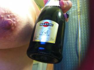 Very yummy tits, I bet they would look and taste great covered in that champagne mmmmmmmm ;  ).