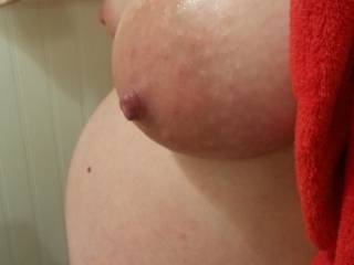 Huge swollen tits resting on my baby bump