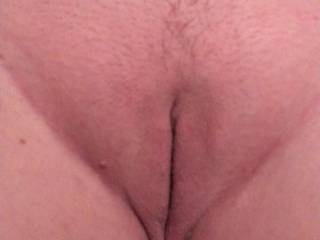 The wife\'s freshly shaved pussy.