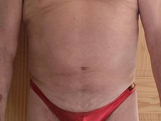 My favourite red thong, it\'s a bit of fun and it makes me hard when I wear it.