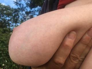 2 of 4 - offering right tit, in close-up