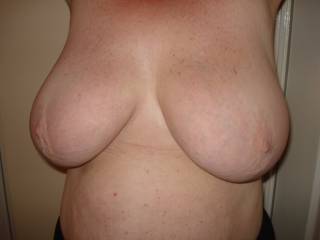 Mmmmm love to cover those gorgeous breasts with cum and then lick them clean