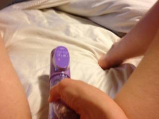 My wife playing with her rabbit vibrator. She loves this thing!