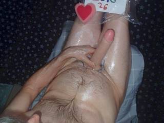 Above partial body view as I toy play sitting in a chair and lube flowing about as I play...TG1 camera was used.