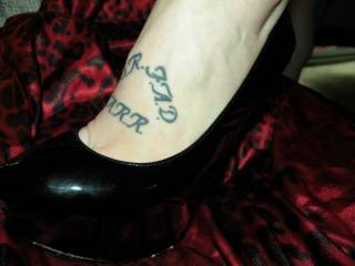 some of my favorite shoes and my foot tattoo (doesnt hurt like everyone says feet do... but i like pain :) )