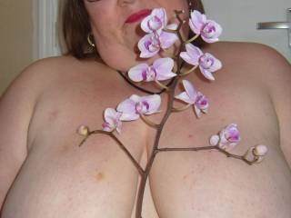 Flower's between my girlfriends lovely big breast.
