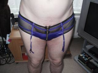 close up of blue panties with suspender straps
