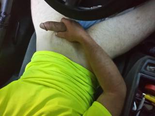 My extremely hard cock in my truck in traffic