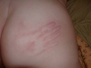 I found a few pics of me and a former fuck buddy together. He liked to see how good of a hand print he could get on my ass. Think he did a good job?