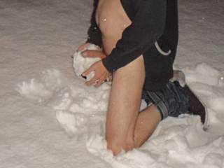 He's trying to make a mould of his cock in the snow but it keeps melting ....lol... Any ladies want to give him a hand?