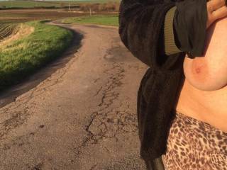 A lovely winding country road at sunset. Also big tits