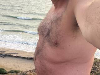 Naked on the cliff top