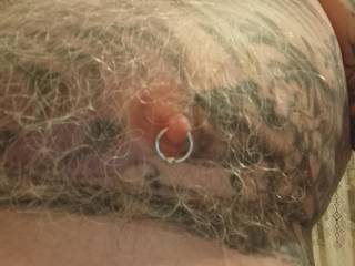 My tattoo\'d pierced nipple,